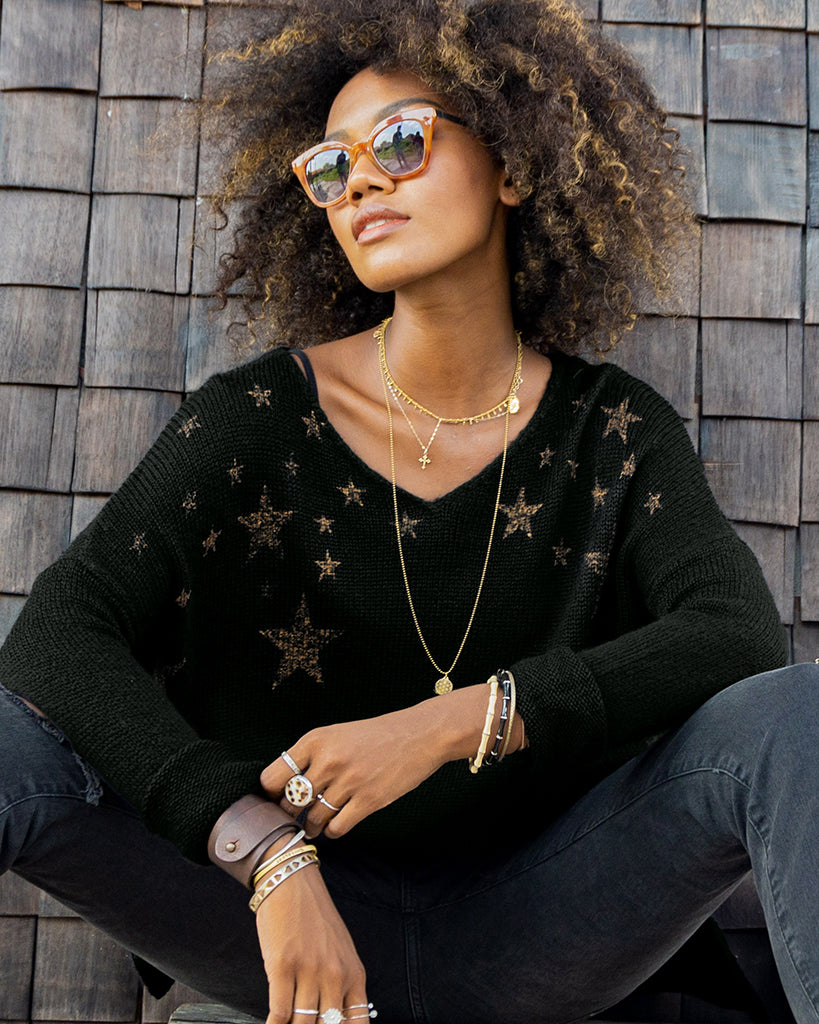 Black sweater with gold stars best sale